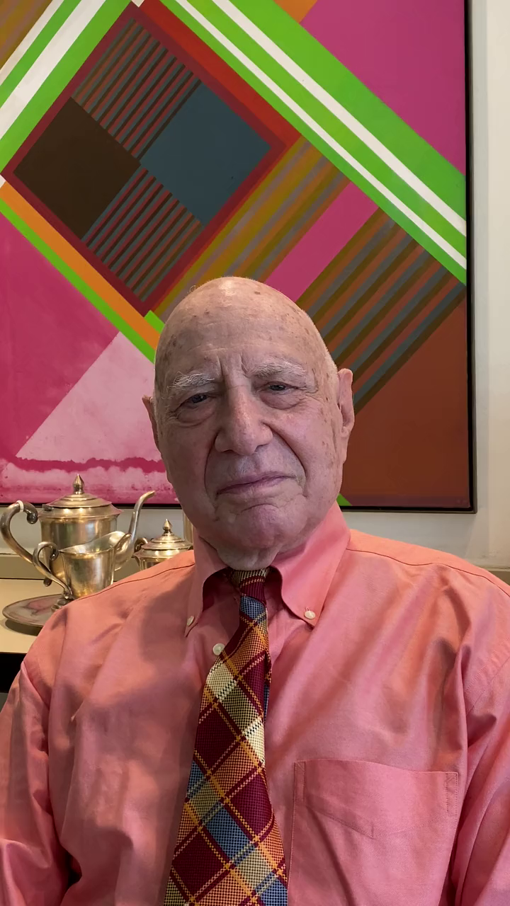 Dr. Herbert Robbins in his New York office, in front of a geometric painting